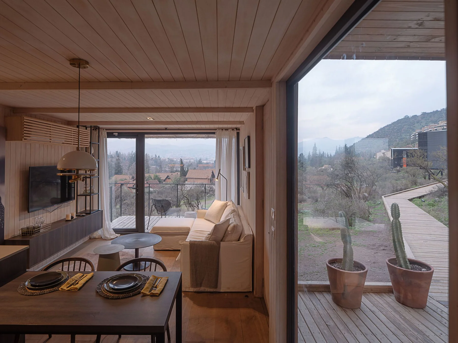 Tiny House / Cazú Zegers Arquitectura - Interior Photography, Living Room, Table, Windows, Chair, Beam